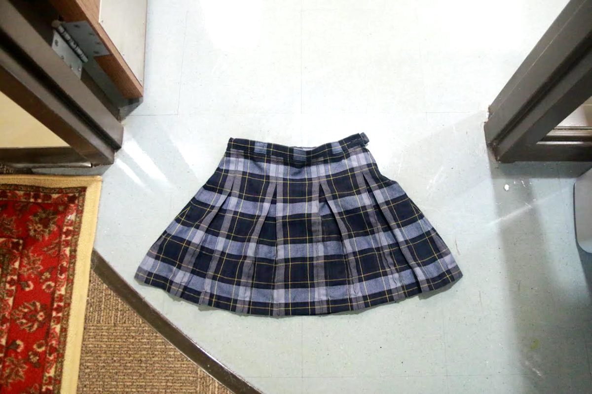 A Westminster Skirt, laying on the ground