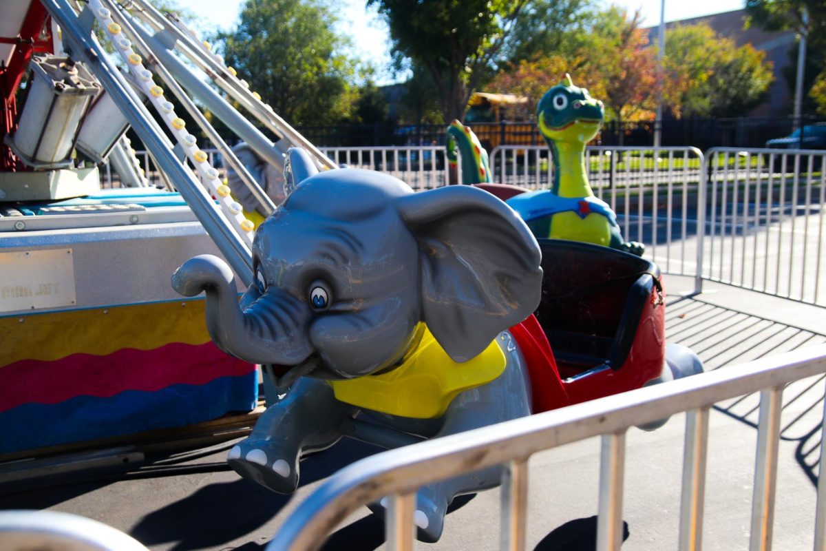 A New Carnival Ride Featuring Seats That Look Like Elephants and Dragons