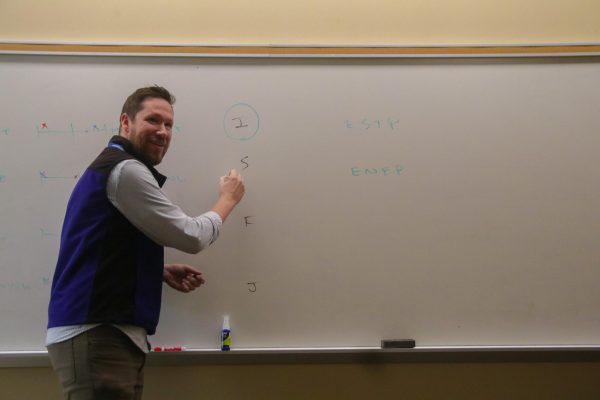 Jeremy Irwin Cheerfully Teaches a Psychology Class at a Whiteboard