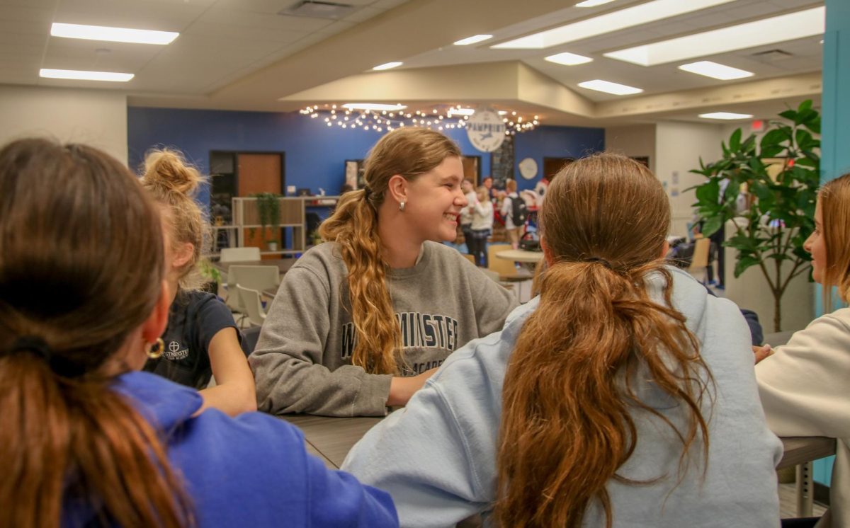 Nora Ottolini, 8th grade, speaks in a Middle School Leadership Team meeting. 