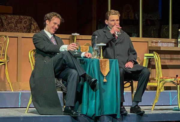 Abel Tucker and Chase Borage Act Out Their Roles in Westminster's Production of Murder on the Orient Express